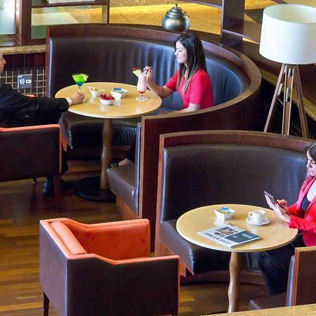 فندق ماريوت مطار ساو باولو جوارولوس المظهر الخارجي الصورة The lounge at the airport
