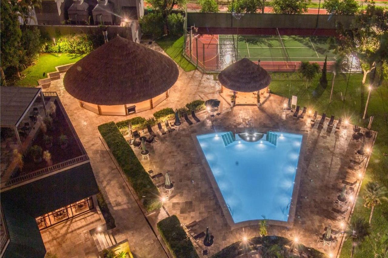 فندق ماريوت مطار ساو باولو جوارولوس المظهر الخارجي الصورة The swimming pool at the hotel
