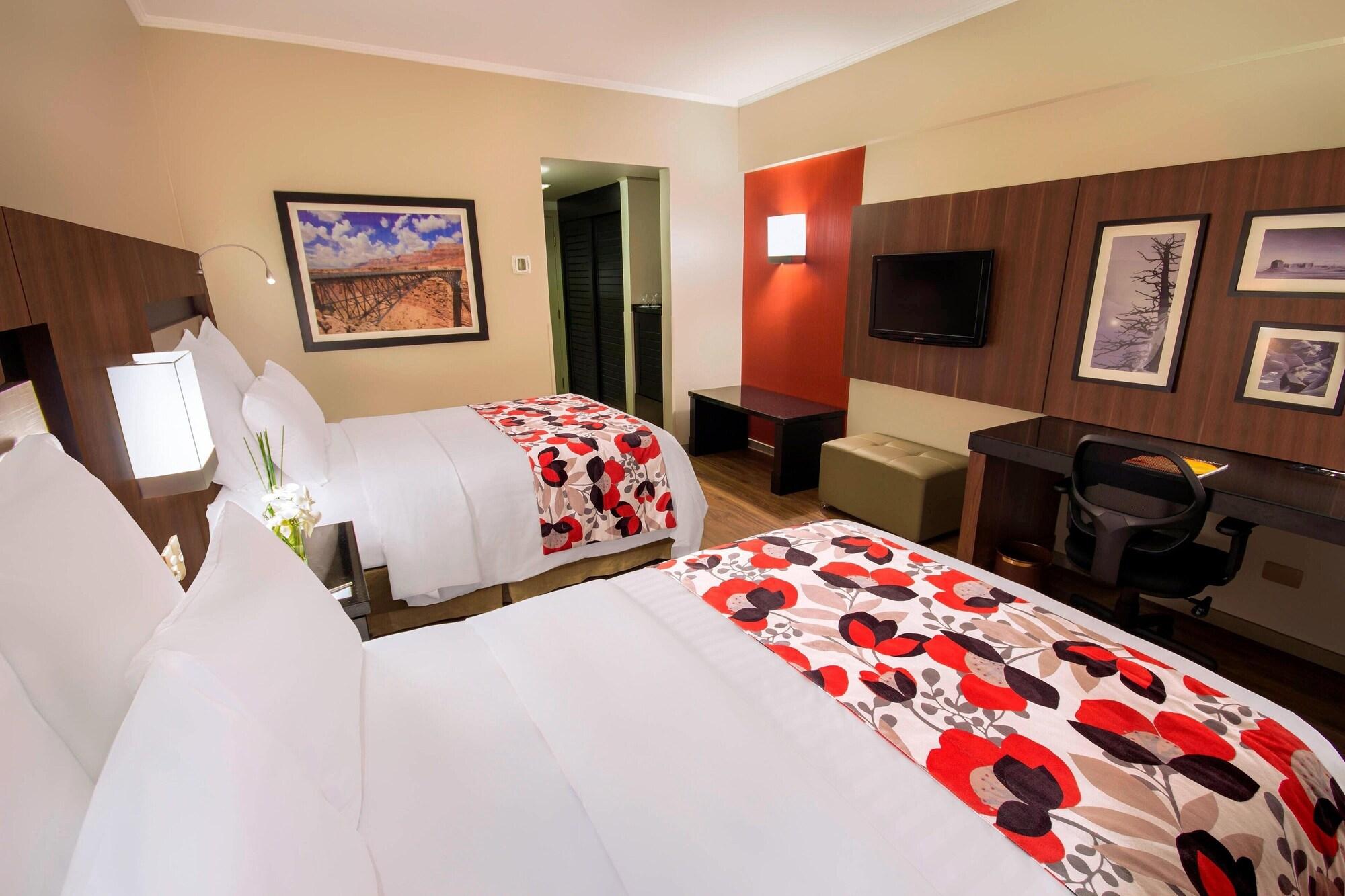 فندق ماريوت مطار ساو باولو جوارولوس المظهر الخارجي الصورة A typical room at the Hilton Garden Inn