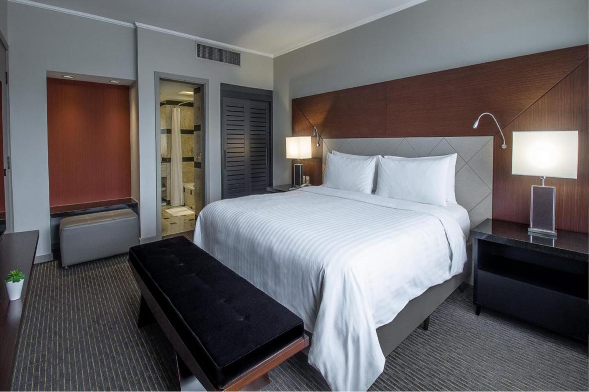فندق ماريوت مطار ساو باولو جوارولوس المظهر الخارجي الصورة A bedroom at the Four Seasons Hotel